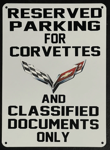 "Reserved Parking for Corvettes and Classified Documents" sign